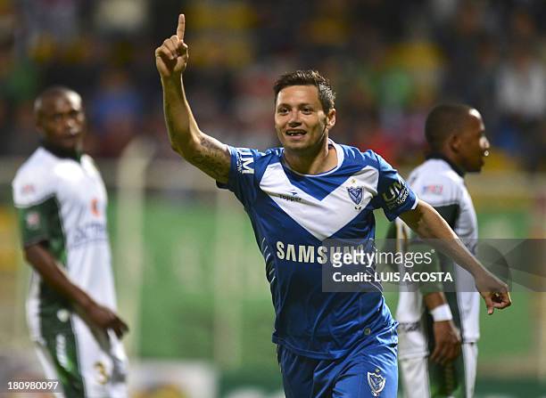 Argentina's Velez Sarfiield's player Mauro Zárate celebrates after scoring against Colombia's La Equidad during their Copa Sudamericana 2013 match at...