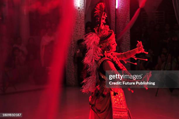 November 26 Sylhet, Bangladesh: Manipuri girls dressed in traditional costumes perform a musical artistic dance to celebrate Raas Leela Festival at...