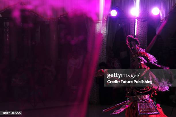 November 26 Sylhet, Bangladesh: Manipuri girls dressed in traditional costumes perform a musical artistic dance to celebrate Raas Leela Festival at...