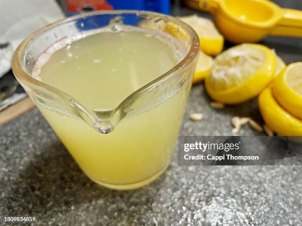 lemon juice ready for cooking - lemon juice stock pictures, royalty-free photos & images
