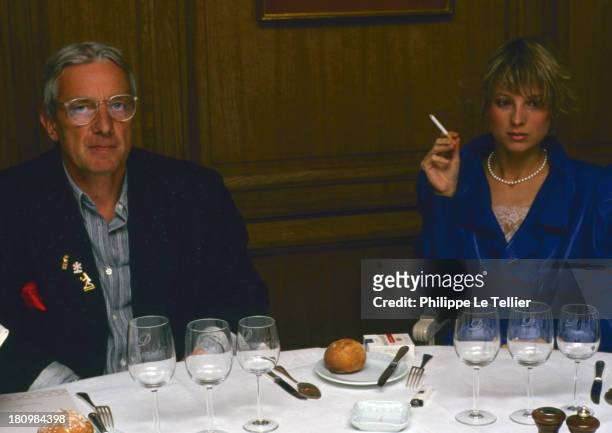 Pianist Helene Mercier and photographer Just Jaeckin during a dinner in 1988, France;La pianiste Helene Mercier et le photographe Just Jaeckin au...
