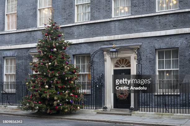 View of the Christmas tree adorned with UK symbols and set up in front of Prime Minister's office in Downing Street in London, United Kingdom on...