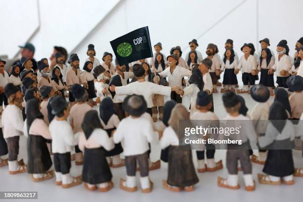 Diorama of indigenous people in the Blue Zone ahead of the COP28 climate conference at Expo City in Dubai, United Arab Emirates, on Wednesday, Nov....