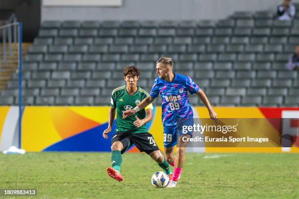 Jakob Jantscher of Kitchee fights for the ball with Hong Jeong-Ho of Jeonbuk Hyundai Motors during the AFC Champions League Group F match between...