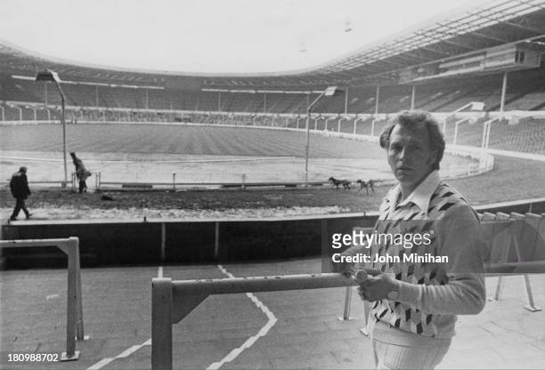 American stunt person Evel Knievel visits Wembley Stadium in preparation for his upcoming attempt to jump thirteen buses inside the stadium, London,...