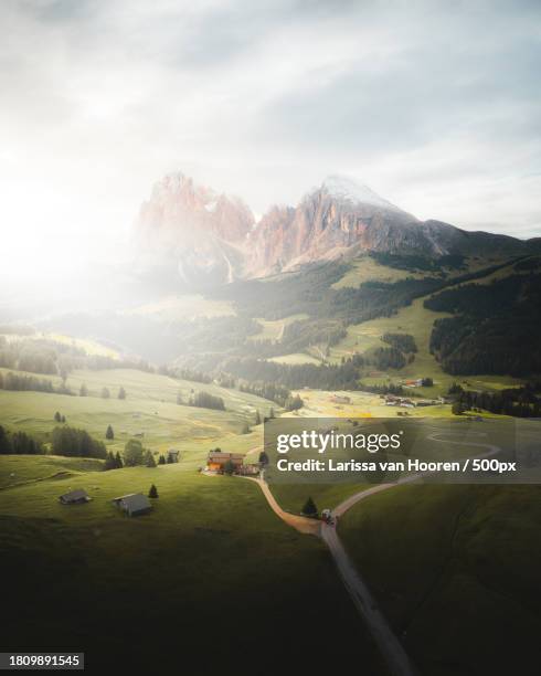 scenic view of landscape and mountains against sky,castelrotto,italy - seiser alm stock pictures, royalty-free photos & images