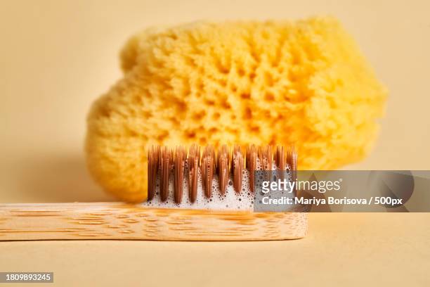 close-up of brush on table - dentifrice stockfoto's en -beelden
