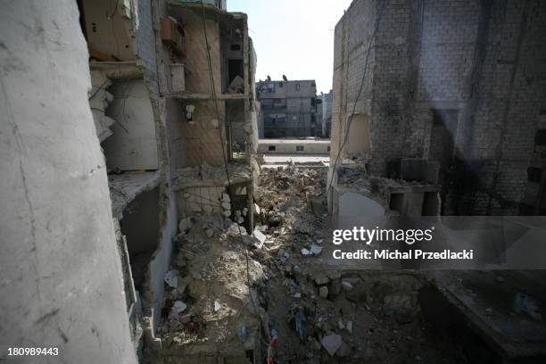 Ruins of an apartment building in Al Fardous district of Aleppo, hit by an aerial bombardment. November 2012, Aleppo, Syria.