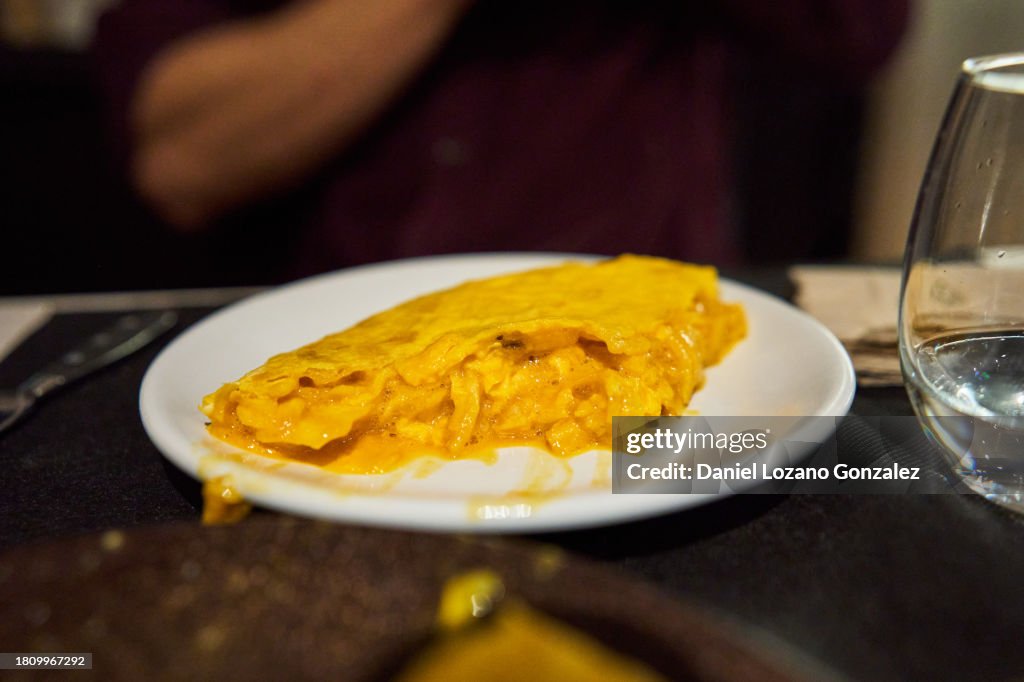 Sliced Spanish Tortilla on White Plate
