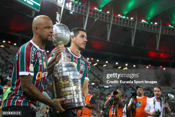 Nino Mota and Felipe Melo of Fluminense shows the trophy Copa CONMEBOL Libertadores 2023 for fans prior Campeonato Brasileiro Serie A match between...