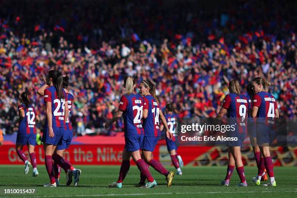 Barcelona players celebrates the team's first goal during the Liga F match between FC Barcelona and Real Madrid Femenino at Estadi Olimpic Lluis...