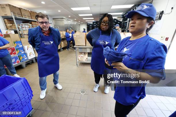 James Welsh and Loni Love attend Thanksgiving at Project Angel Food on November 23, 2023 in Los Angeles, California.