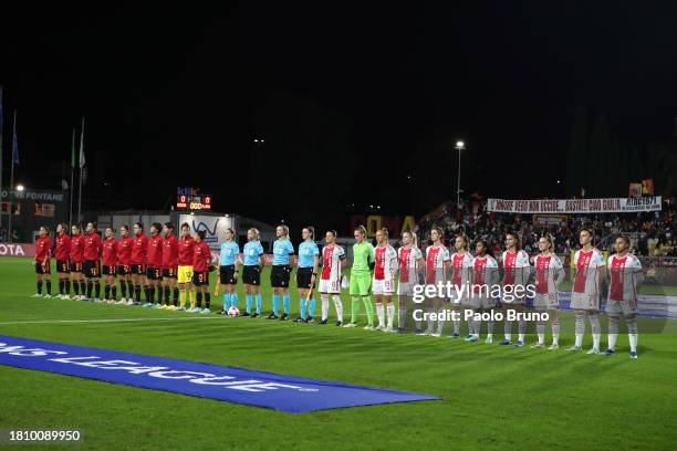 Roma women and AFC Ajax women players stand up during the UEFA Women's Champions League group stage match between AS Roma and AFC Ajax at Stadio Tre...