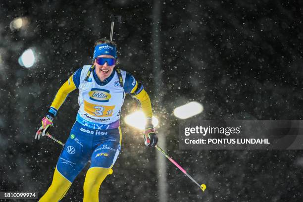 Sweden's Elvira Oeberg competes during the women's 4x6 km relay event of the IBU Biathlon World Cup at the ski stadium in Oestersund, Sweden on...