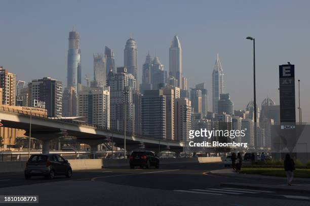 Skyscraper office buildings beyond a road and railway line in Dubai, United Arab Emirates, on Wednesday, Nov. 29, 2023. More than 70,000 politicians,...