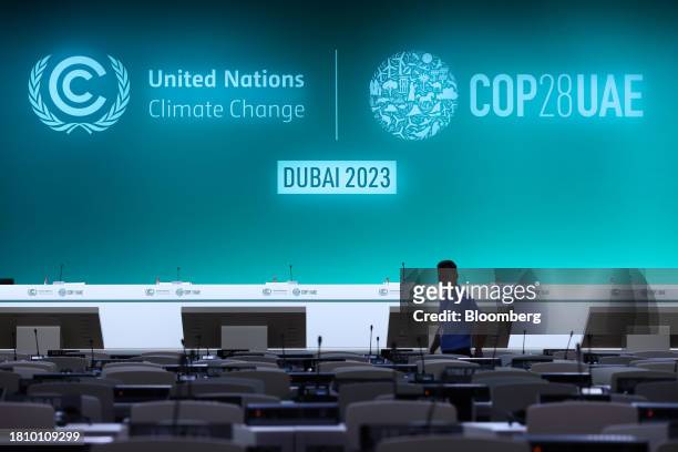Worker prepares a plenary room ahead of the COP28 climate conference at Expo City in Dubai, United Arab Emirates, on Wednesday, Nov. 29, 2023. More...