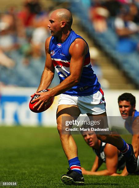 Nathan Eagleton of the Bulldogs swings onto his left foot for a goal during the AFL Wizard Home Loans Pre-Season Cup match between the Geelong Cats...