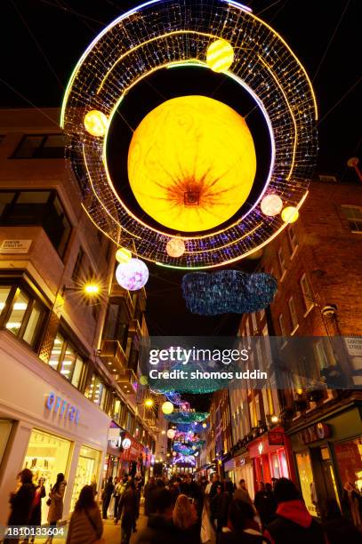 london carnaby street in christmas season - soho london night stock pictures, royalty-free photos & images