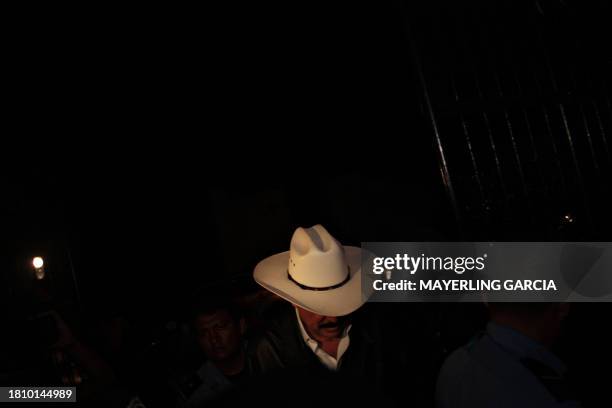 Honduras' ousted President Manuel Zelaya walks into the embassy of Honduras in Nicaragua before a news conference in Managua, July 19, 2009. There...