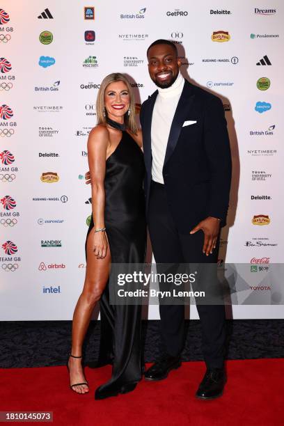 Presenter Orla Chennaoui and Lutalo Muhammad pose for a photo as they arrive for the Team GB Ball 2023 at The Savoy Hotel on November 23, 2023 in...