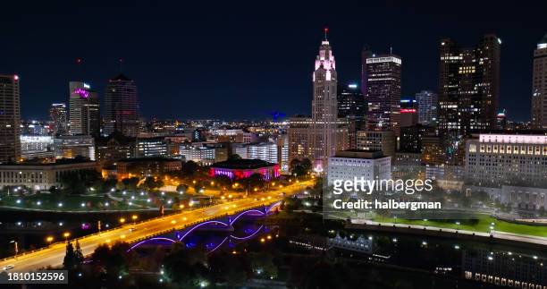 discovery bridge in downtown columbus at night - columbus ohio aerial stock pictures, royalty-free photos & images