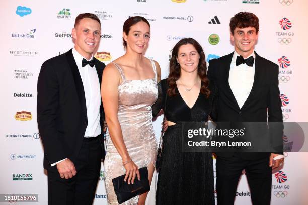 Team GB Canoe Slalom Team athletes Joe Clarke, Mallory Franklin, Kimberley Woods and Adam Burgess pose for a photo as they arrive for the Team GB...