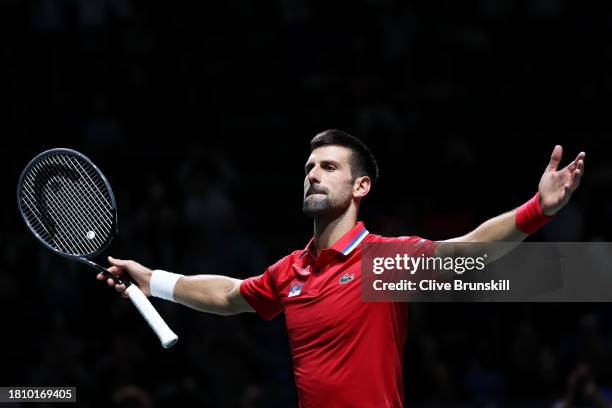 Novak Djokovic of Serbia celebrates winning match point during the Quarter-Final match against Cameron Norrie of Great Britain in the Davis Cup Final...