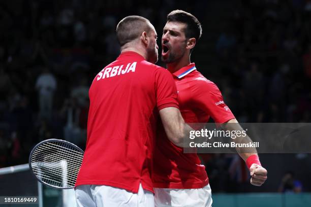 Novak Djokovic of Serbia celebrates winning match point during the Quarter-Final match against Cameron Norrie of Great Britain in the Davis Cup Final...