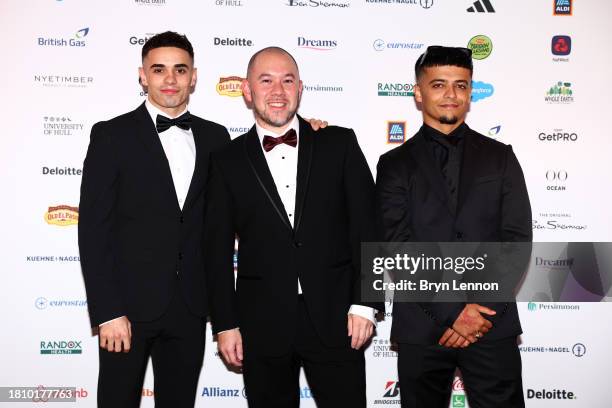 Karam Singh, Rob Pountney and Sunni Brummitt pose for a photo as they arrive for the Team GB Ball 2023 at The Savoy Hotel on November 23, 2023 in...