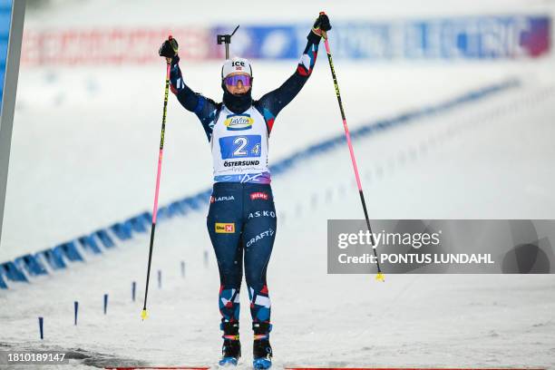 Norway's Ingrid Landmark Tandrevold crosses the finish line after the last round and wins the women's 4x6 km relay event of the IBU Biathlon World...
