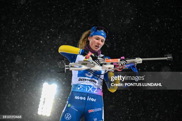 Sweden's Hanna Oeberg competes in the women's 4x6 km relay event of the IBU Biathlon World Cup at the ski stadium in Oestersund, Sweden on November...