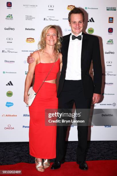 Ruth Astle and Alistair Brownlee pose for a photo as they arrive for the Team GB Ball 2023 at The Savoy Hotel on November 23, 2023 in London, England.