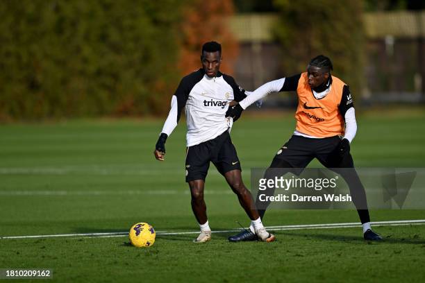 Nicolas Jackson and Lesley Ugochukwu of Chelsea during a training session at Chelsea Training Ground on November 29, 2023 in Cobham, England.