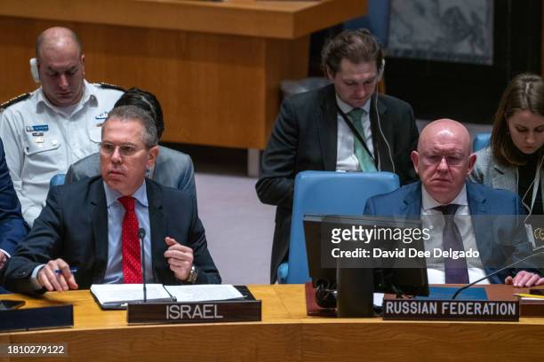 Permanent Representative of Israel to the United Nations Gilad Erdan is seated next to Russia's Ambassador to the United Nations Vasily Nebenzya...