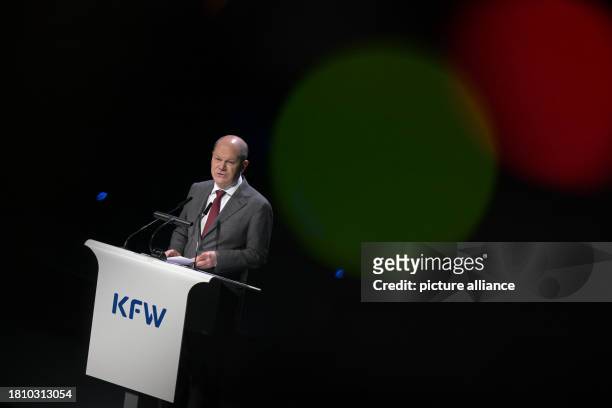 November 2023, Berlin: Olaf Scholz , Federal Chancellor, speaks at the ceremony to mark the 75th anniversary of the state-owned development bank KfW...
