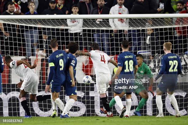 Sergio Ramos of Sevilla FC scores the 1-0 during the UEFA Champions League Group B match between Sevilla FC and PSV Eindhoven at the Estadio Ramon...