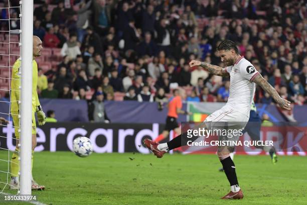 Sevilla's Spanish defender Sergio Ramos reacts to PSV's third goal during the UEFA Champions League first round group B football match between...