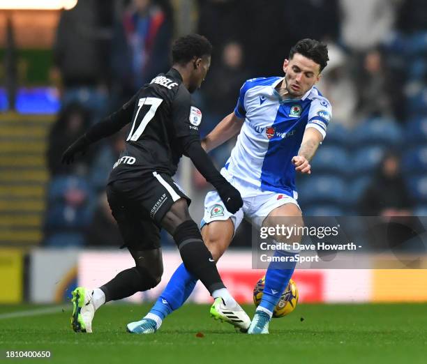 Blackburn Rovers' Lewis Travis competing with Millwall's George News  Photo - Getty Images