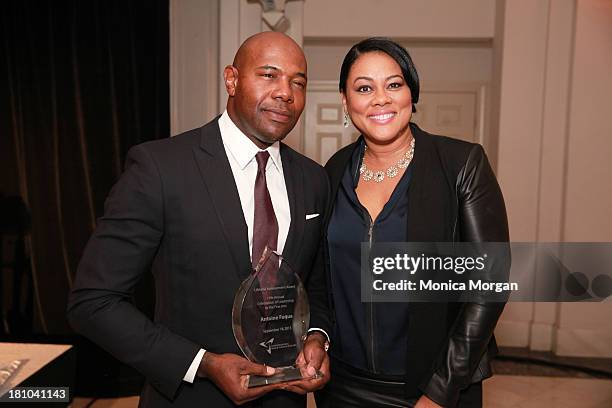 Antoine Fuqua and Lela Rochon attend the Congressional Black Caucus 2013 on September 18, 2013 in Washington, DC.