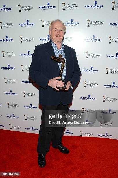 Chris Yewdall receives an award at the International 3D Society & Advanced Imaging Society 3D Products of the Year Awards at Paramount Studios on...