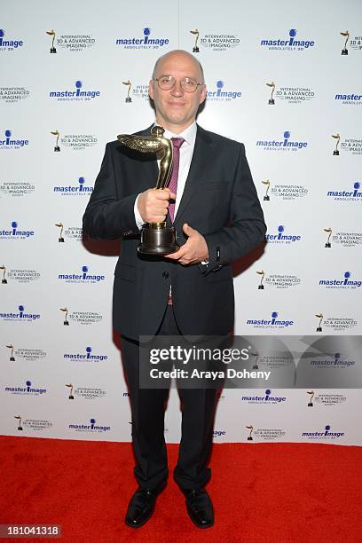 Christian Weissig receives an award at the International 3D Society & Advanced Imaging Society 3D Products of the Year Awards at Paramount Studios on...