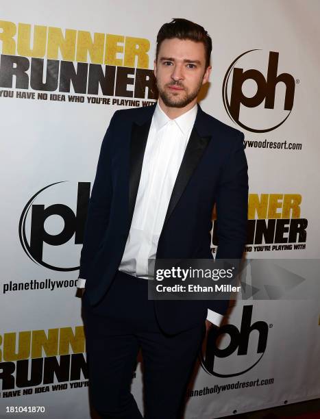 Singer/actor Justin Timberlake arrives at the world premiere of Twentieth Century Fox and New Regency's film "Runner Runner" at Planet Hollywood...