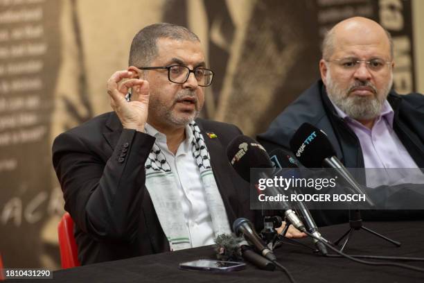 Basem Naim, a Hamas leader who is a former Gaza health minister and Khaled Qaddoumi, Hamas' representative in Iran, speak during a press conference...