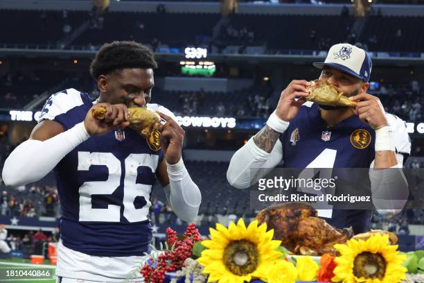 DaRon Bland Dak Prescott of the Dallas Cowboys take a bite out of a turkey leg after a win over the Washington Commanders at AT&T Stadium on November...