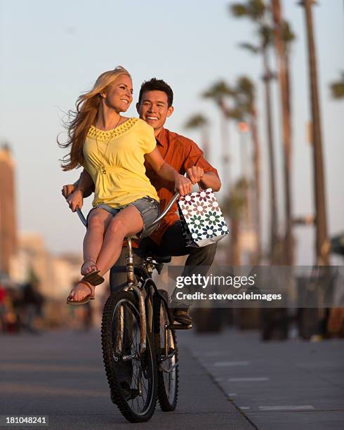 couple cycling - handlebar stock pictures, royalty-free photos & images