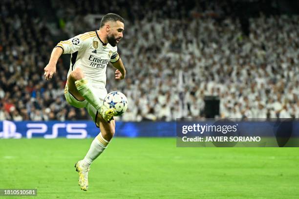 Real Madrid's Spanish defender Dani Carvajal controls the ball during the UEFA Champions League first round group C football match between Real...