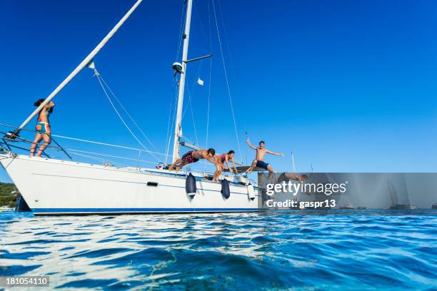 "été eau" - jumping of boat photos et images de collection