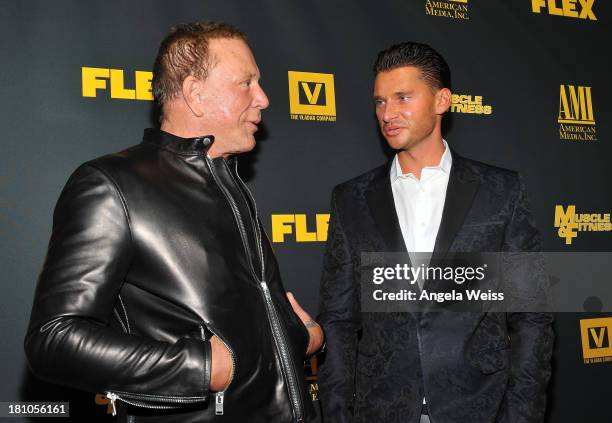 Actor Mickey Rourke and director/producer Vlad Yudin arrive at the Los Angeles premiere of 'GENERATION IRON' at Chinese 6 Theater Hollywood on...