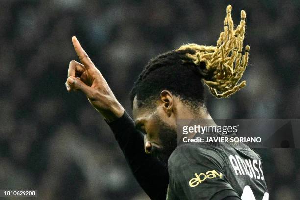Napoli's Cameroon midfielder Andre Zambo Anguissa celebrates his team's second goal during the UEFA Champions League first round group C football...
