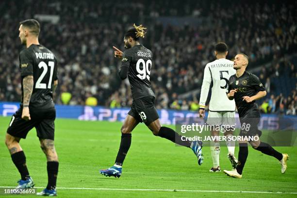 Napoli's Cameroon midfielder Andre Zambo Anguissa celebrates scoring his team's second goal during the UEFA Champions League first round group C...